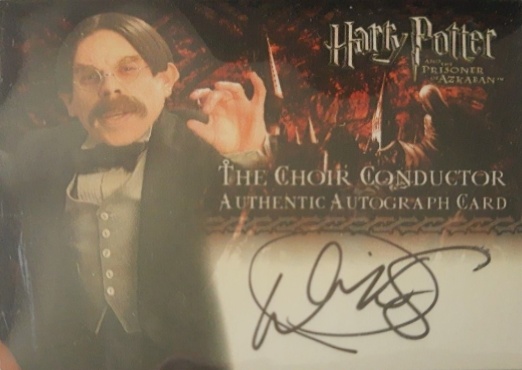 Warwick Davis as The Choir Conductor - Front