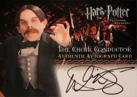 Warwick Davis as The Choir Conductor - Front