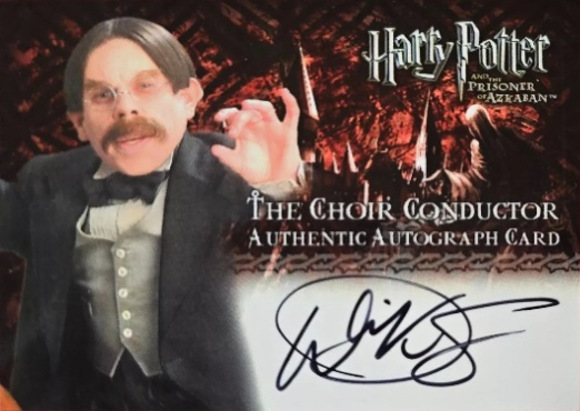 Warwick Davis as The Choir Conductor - Front