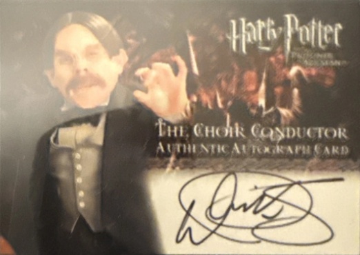 Warwick Davis as The Choir Conductor - Front