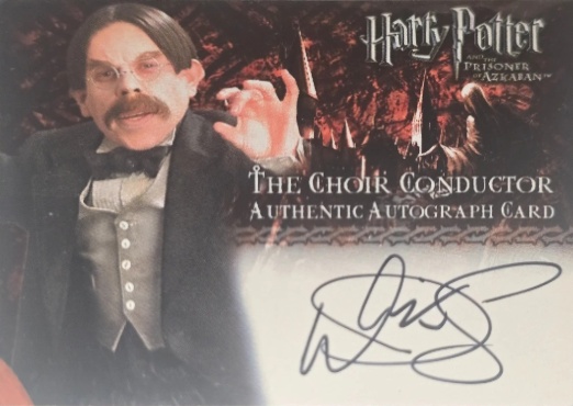 Warwick Davis as The Choir Conductor - Front